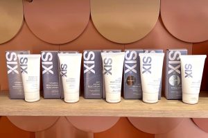 SIX Skincare products on a shelf